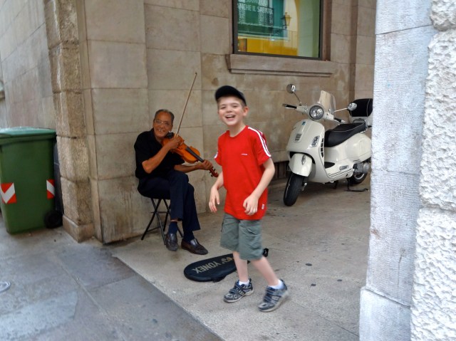 Nikolas delighted this street performer by insisting that we give him a coin!