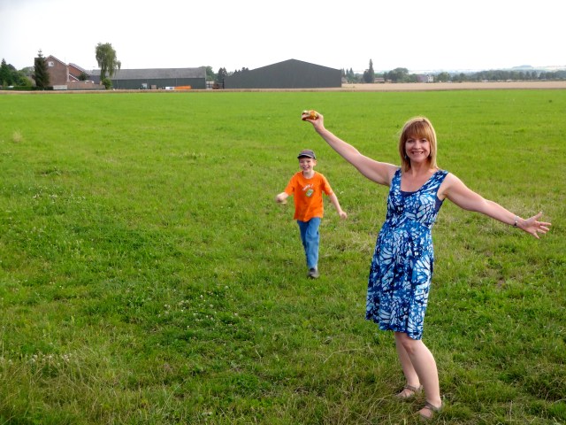 We got to frolic briefly in the field before a light rain chased us back into the car to finish our picnic:(
