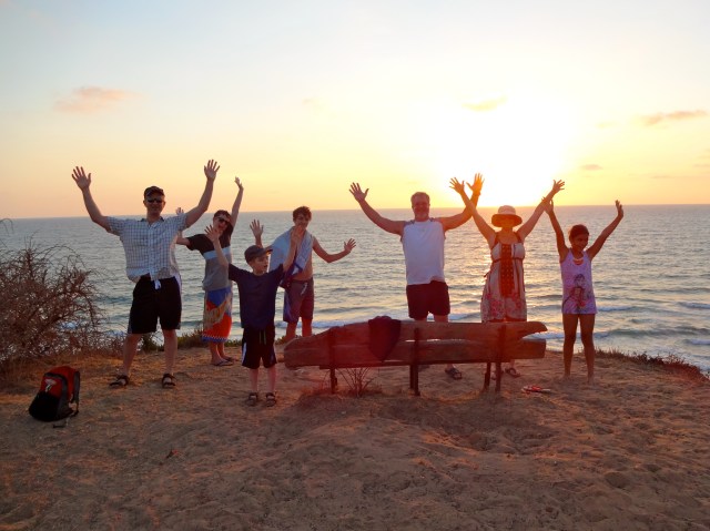 I got the whole group to pose like this, but instead of a "Praise God!" photo it looks more like "Stop, don't shoot!"